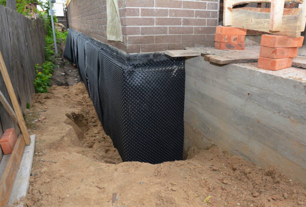 Happy homeowners after waterproofing job in Riverview